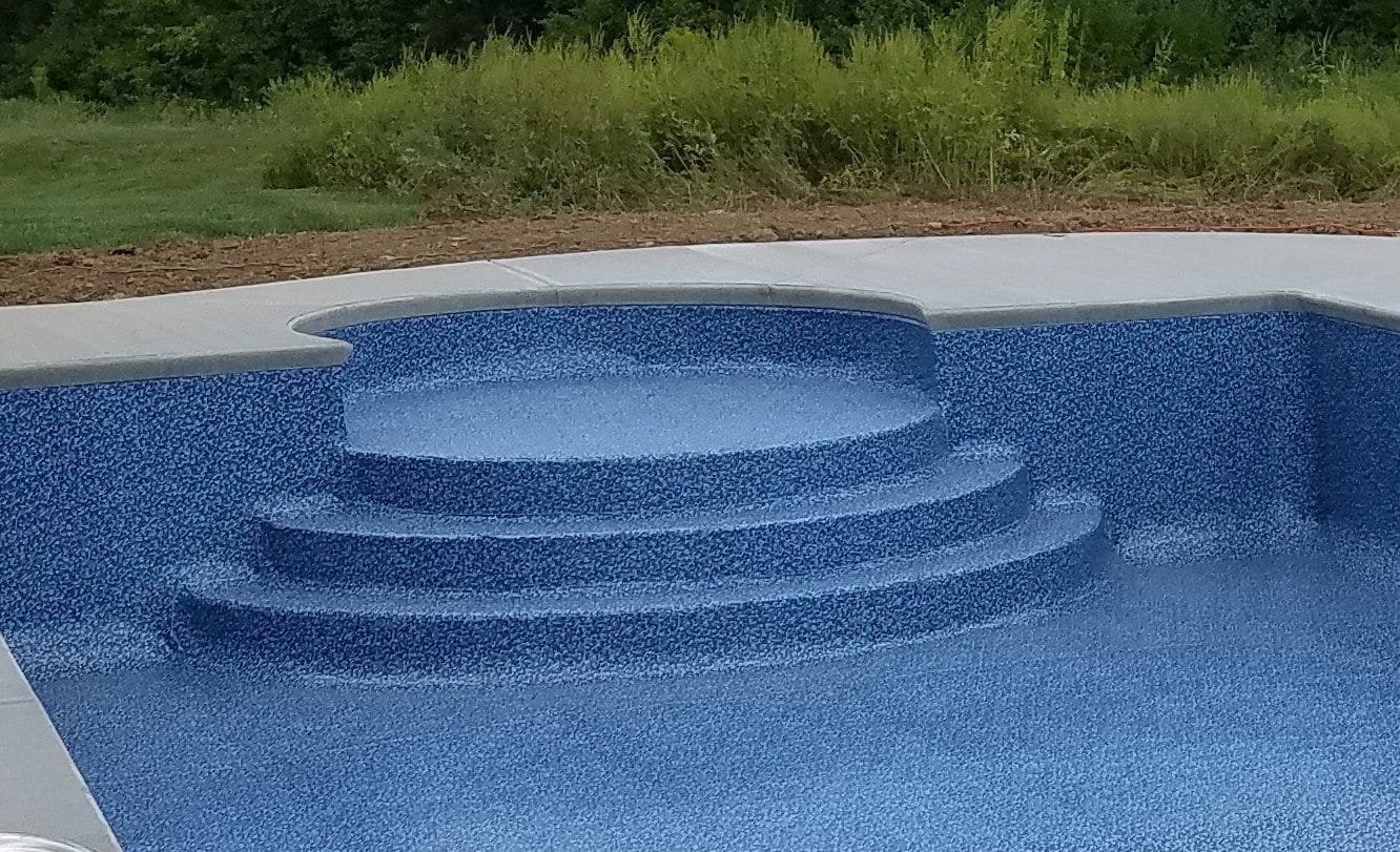 Concrete steps with liner over top